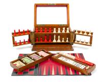 A Victorian Oak Games Compendium Height 7 3/4 x width 13 3/4 x depth 9 5/8 inches. — 19TH CENTURY