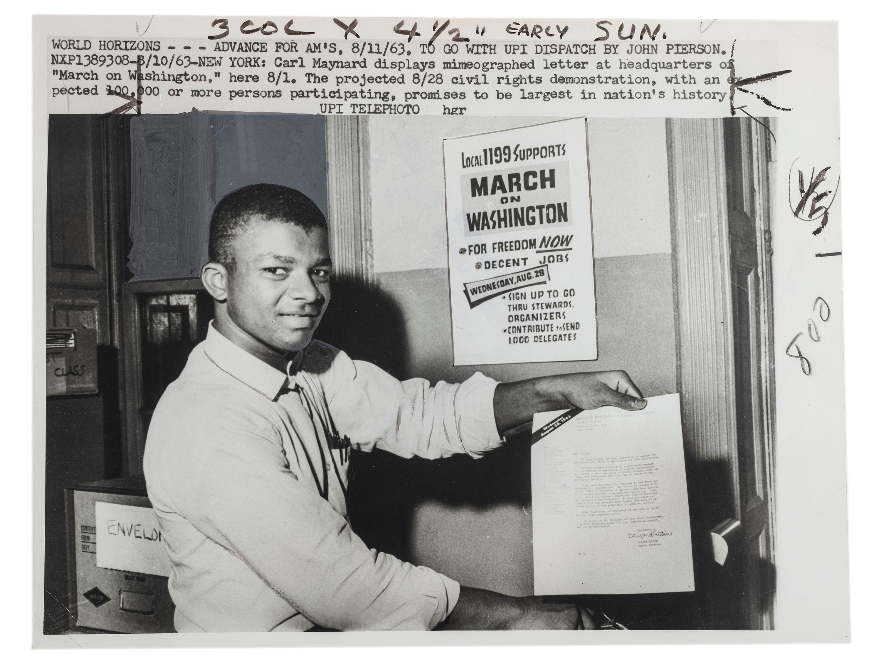[CIVIL RIGHTS]. Press photograph of Carl Maynard, a young African American at the March on Washington headquarters, posed with letter and poster promoting the upcoming demonstration. New York, 11 August 1963.
