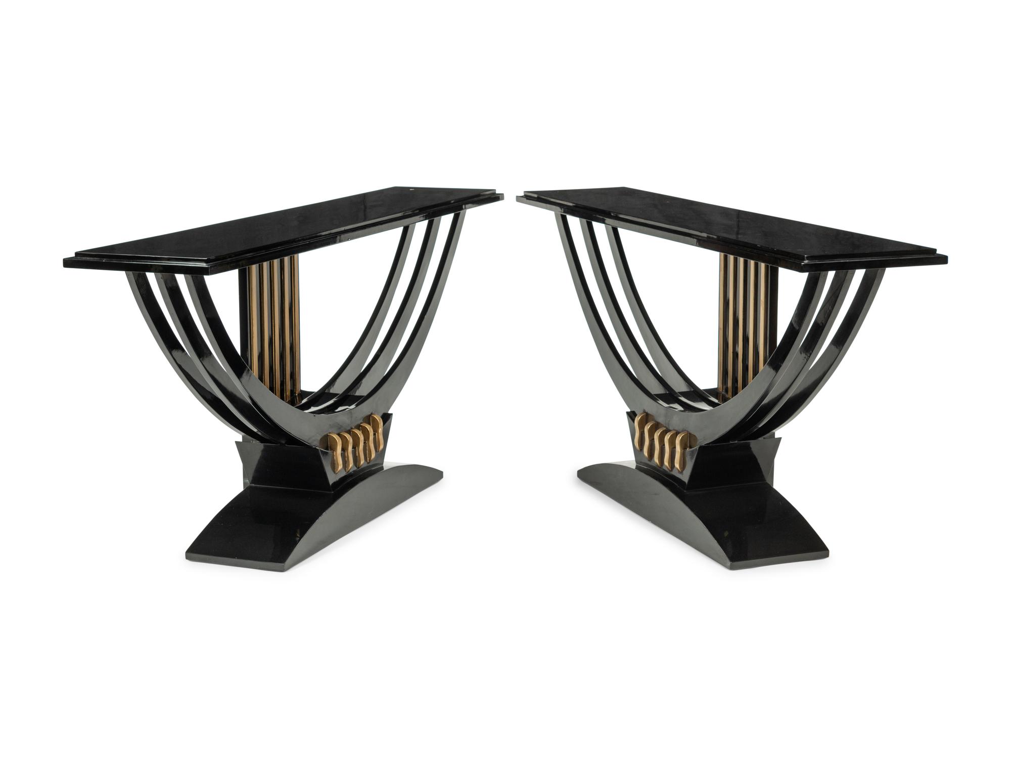 A Pair of Art Deco Style Black-Painted and Parcel Gilt Console Tables