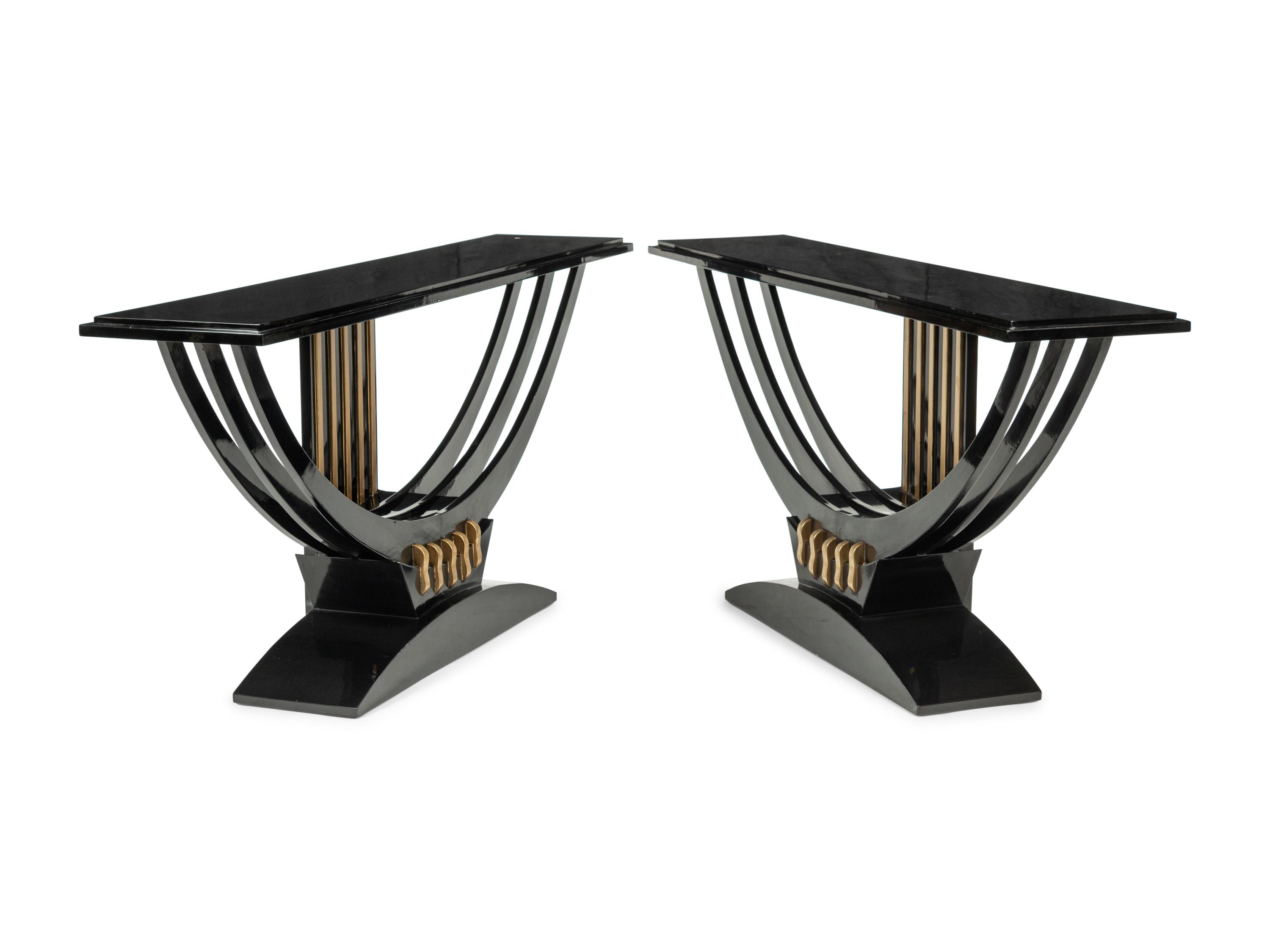 A Pair of Art Deco Style Black-Painted and Parcel Gilt Console Tables