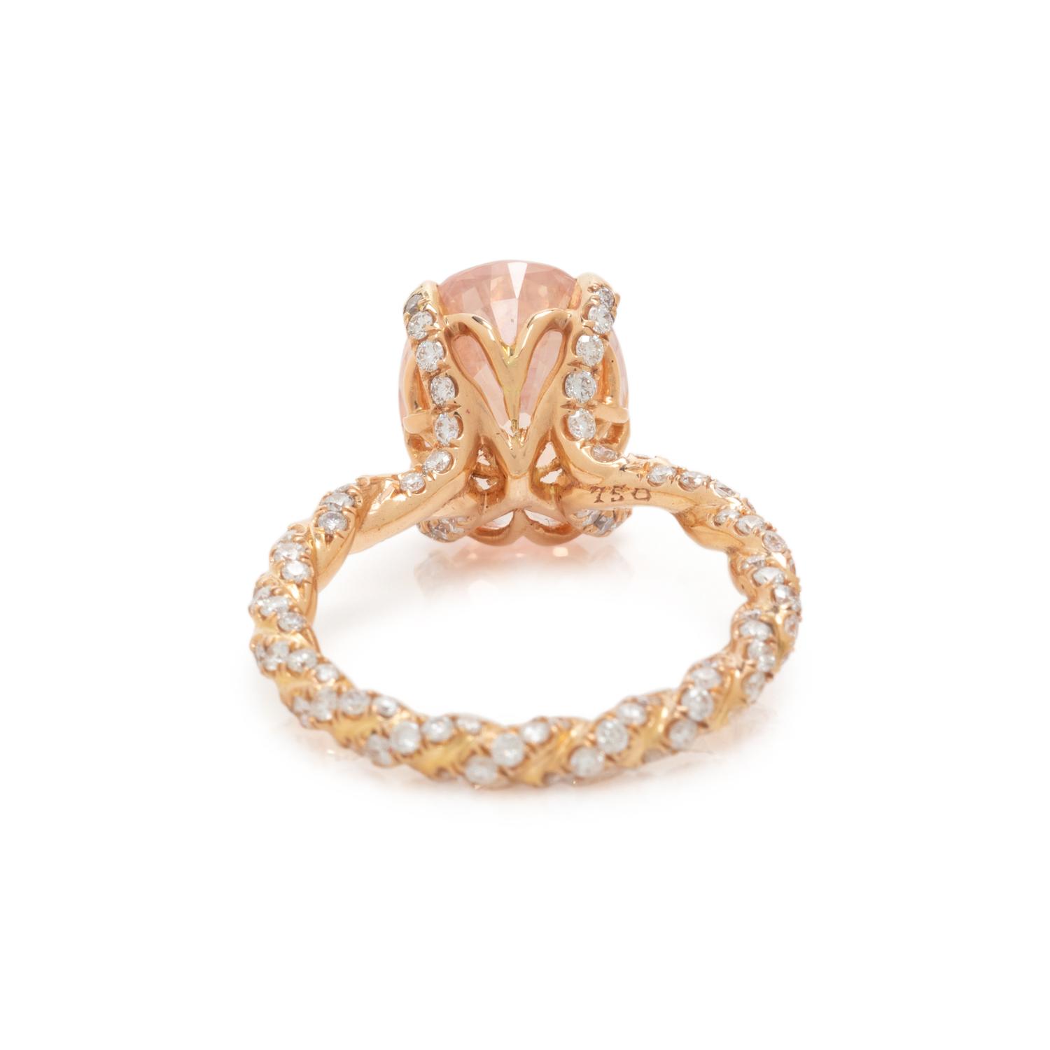 ORANGE SAPPHIRE AND DIAMOND RING