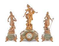 A French Onyx and Gilt Metal Clock Garniture