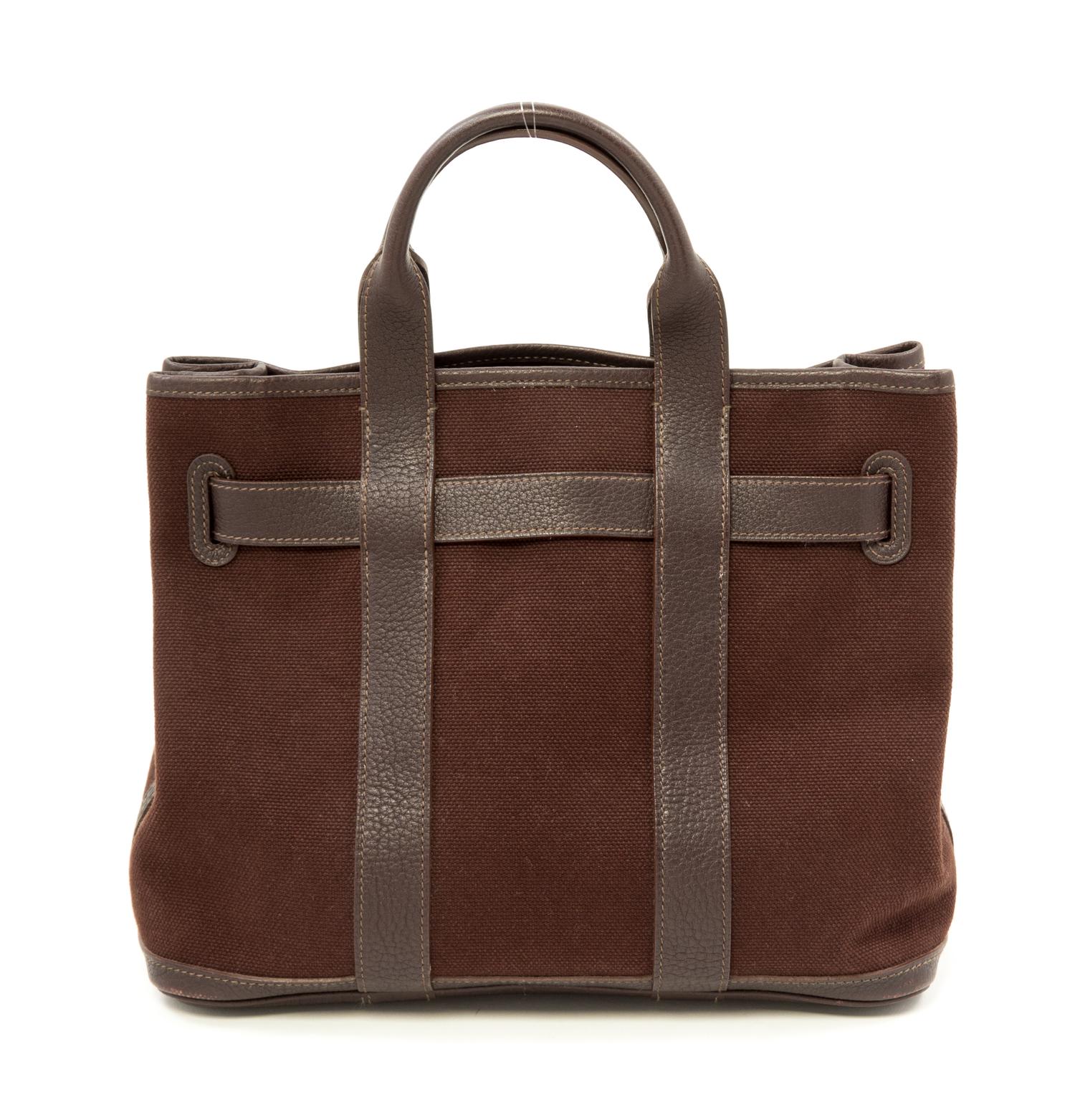 An Hermès Brown Canvas Sac Petite Ceinture PM, 12" x 9.5" x 5"; Handle drop: 4".