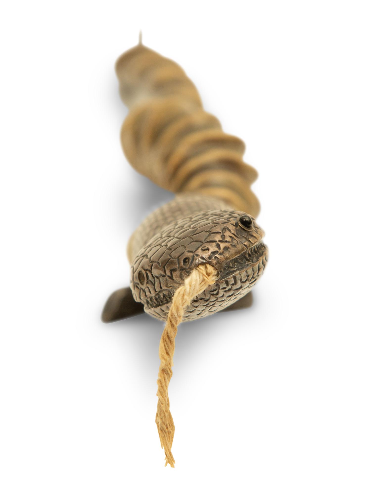 An English Silver Mounted Antelope Horn Snake-Form Cigar Lighter