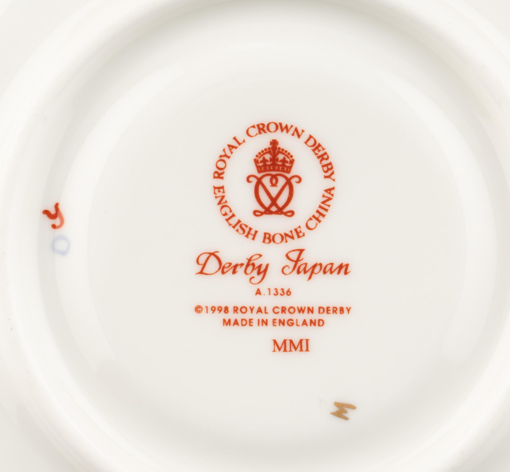 A Royal Crown Derby Porcelain Dinner Service