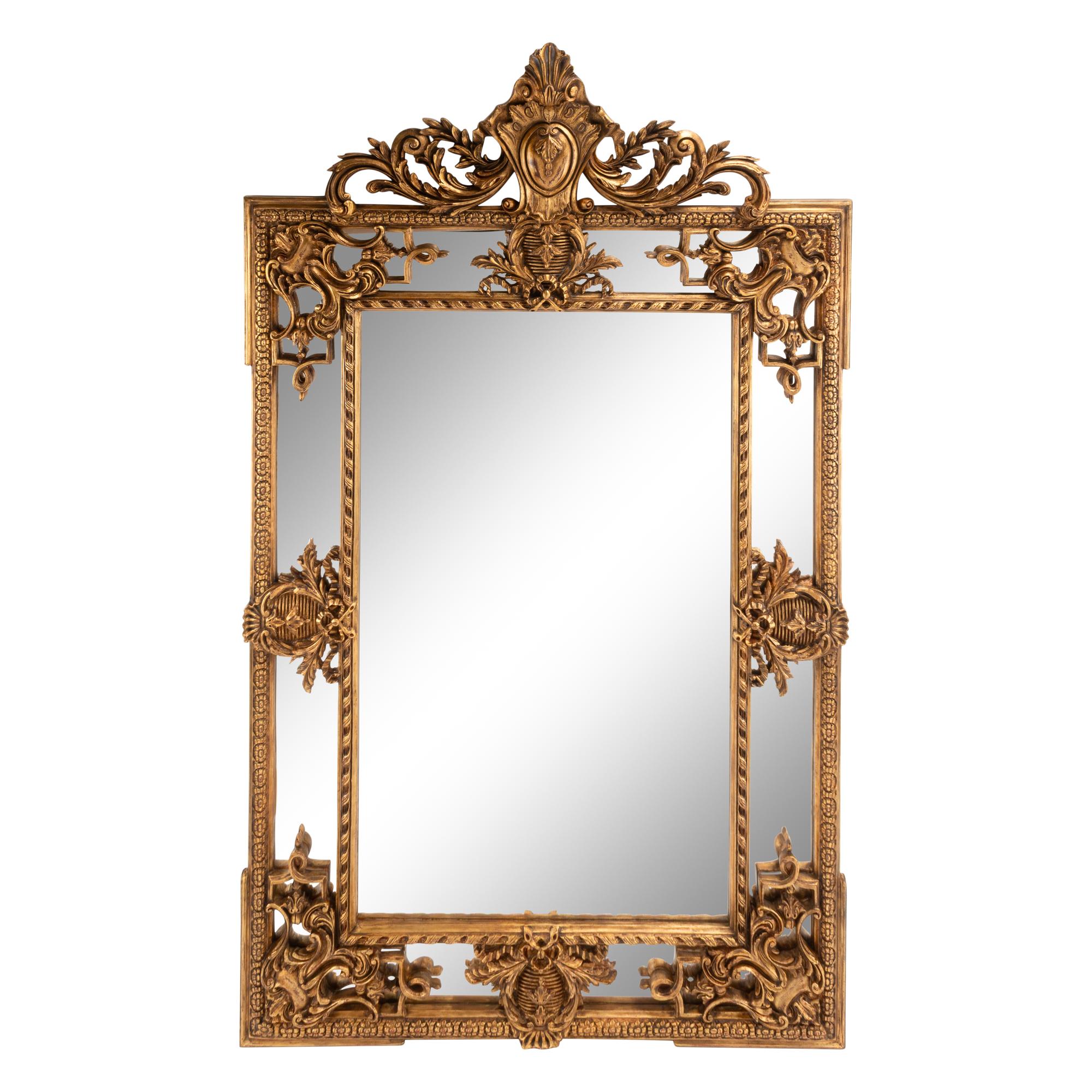 A Pair of Large Régence Style Giltwood Mirrors