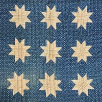 A Pieced Cotton Blue and White "Stars" Crib Quilt