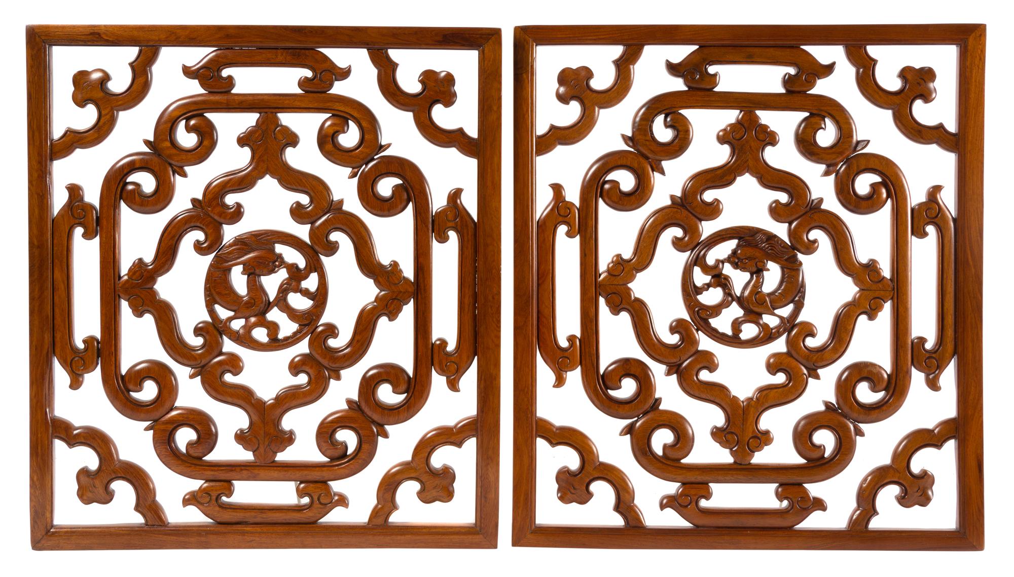 A Pair of Chinese Huanghuali Reticulated Panels Height 20 5/8 x width 18 3/8 x depth 3/4 inches. — QING DYNASTY (1644-1911)