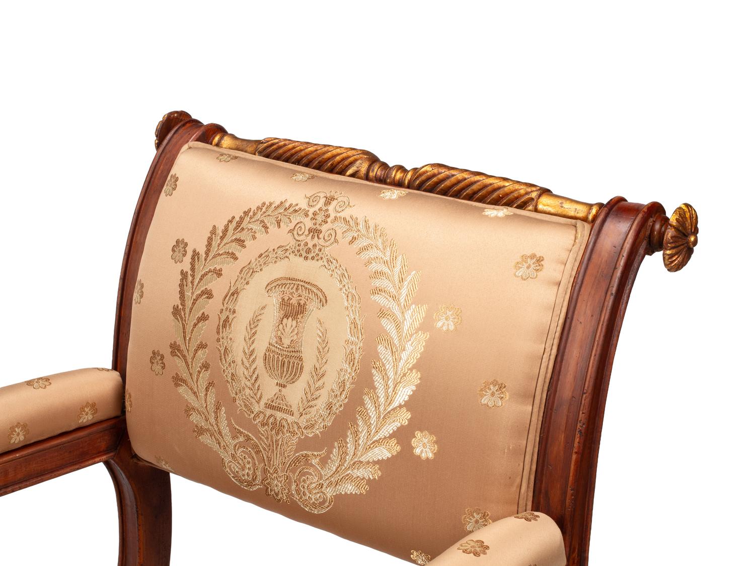 A Pair of Empire Style Parcel Gilt Walnut Armchairs