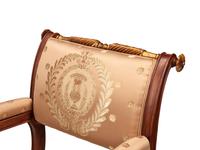 A Pair of Empire Style Parcel Gilt Walnut Armchairs