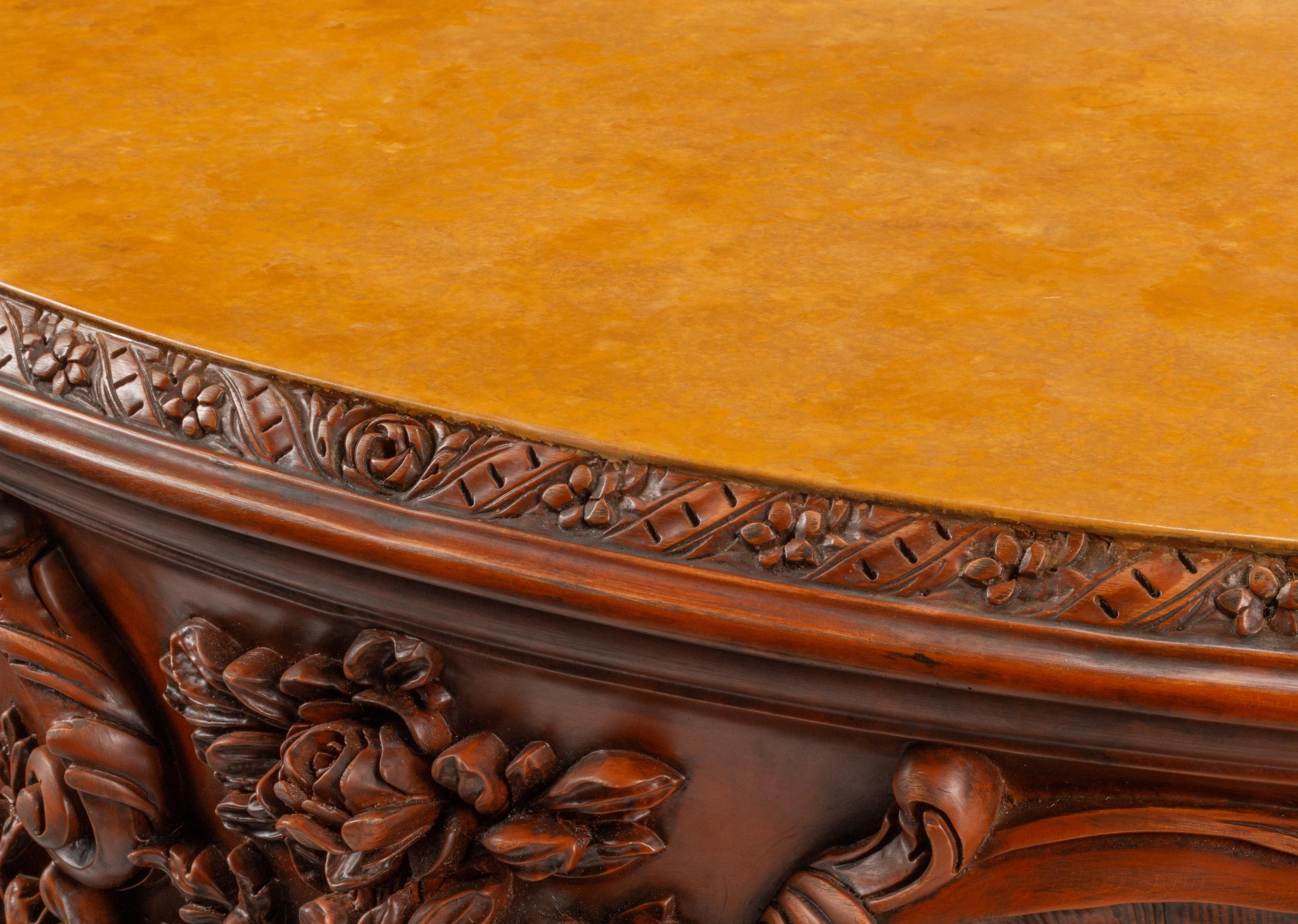 A Continental Floral-Carved and Painted Wood Commode