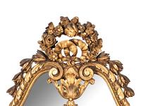 An Italian Baroque Style Giltwood Mirror