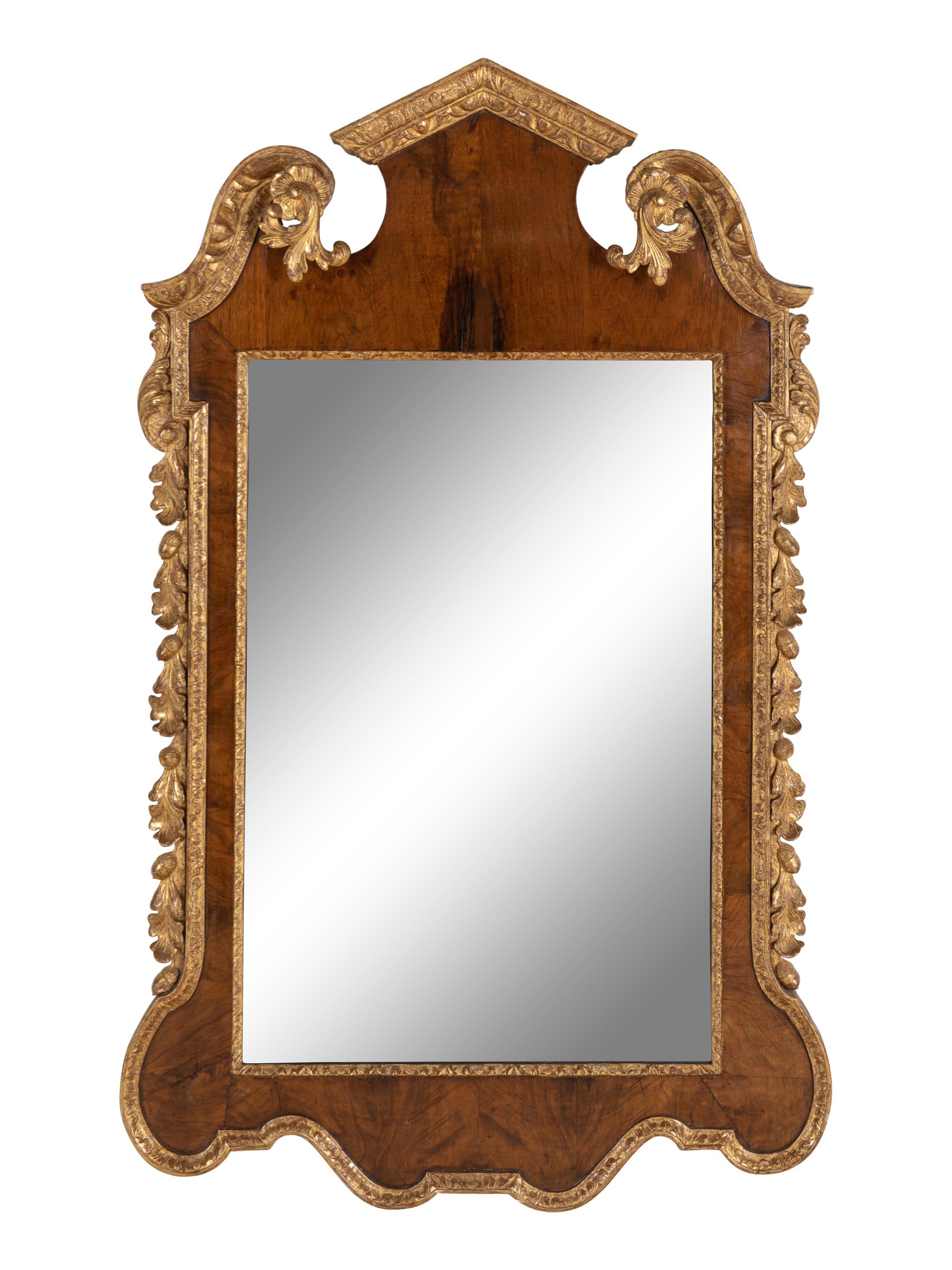 A George II Walnut and Parcel Gilt Mirror