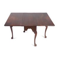 A Chippendale Carved Walnut Drop-Leaf Dining Table