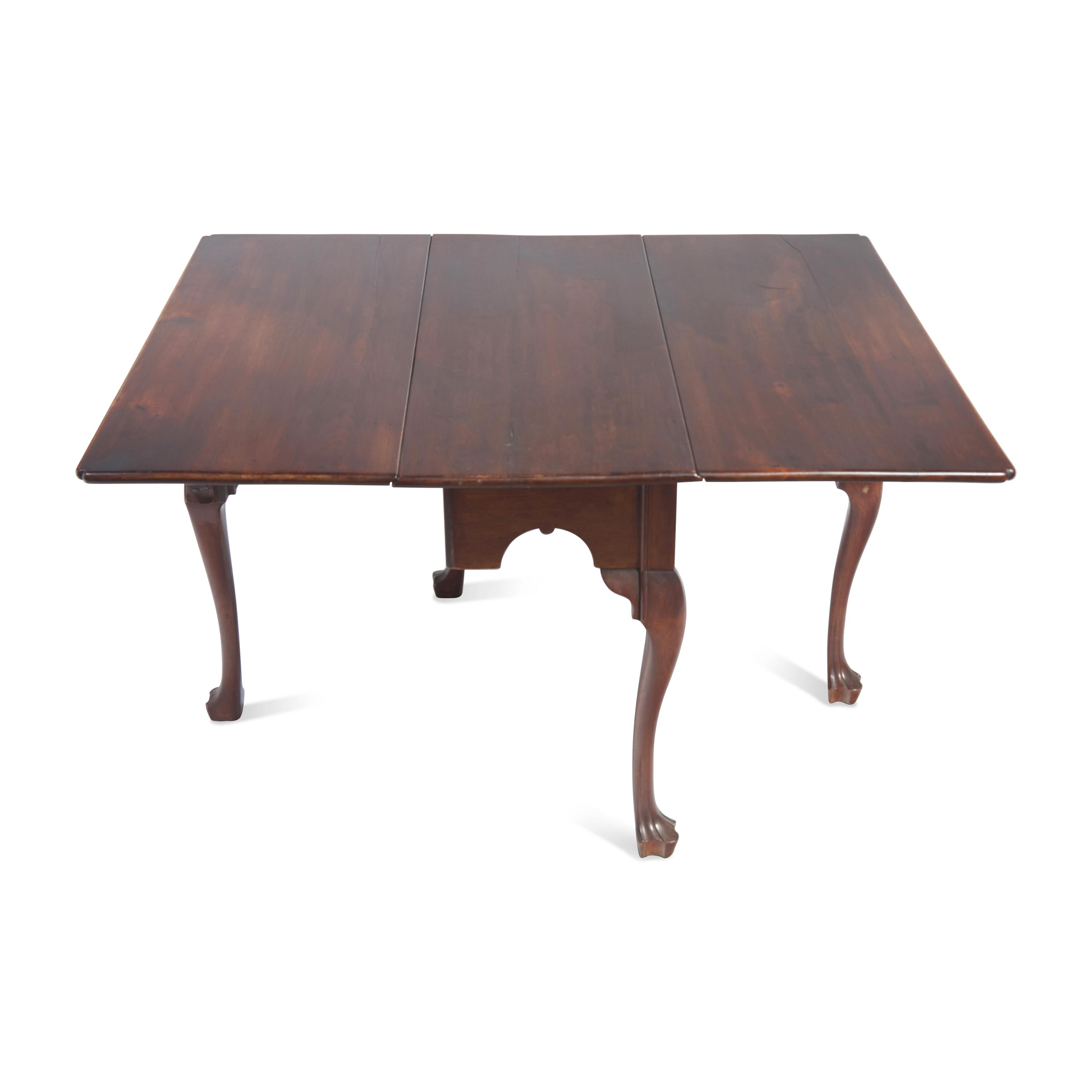 A Chippendale Carved Walnut Drop-Leaf Dining Table