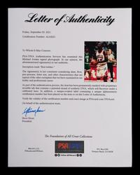 A Vintage Michael Jordan Signed Autographed Chicago Bulls 45 Jersey Photograph (PSA Authentic)
