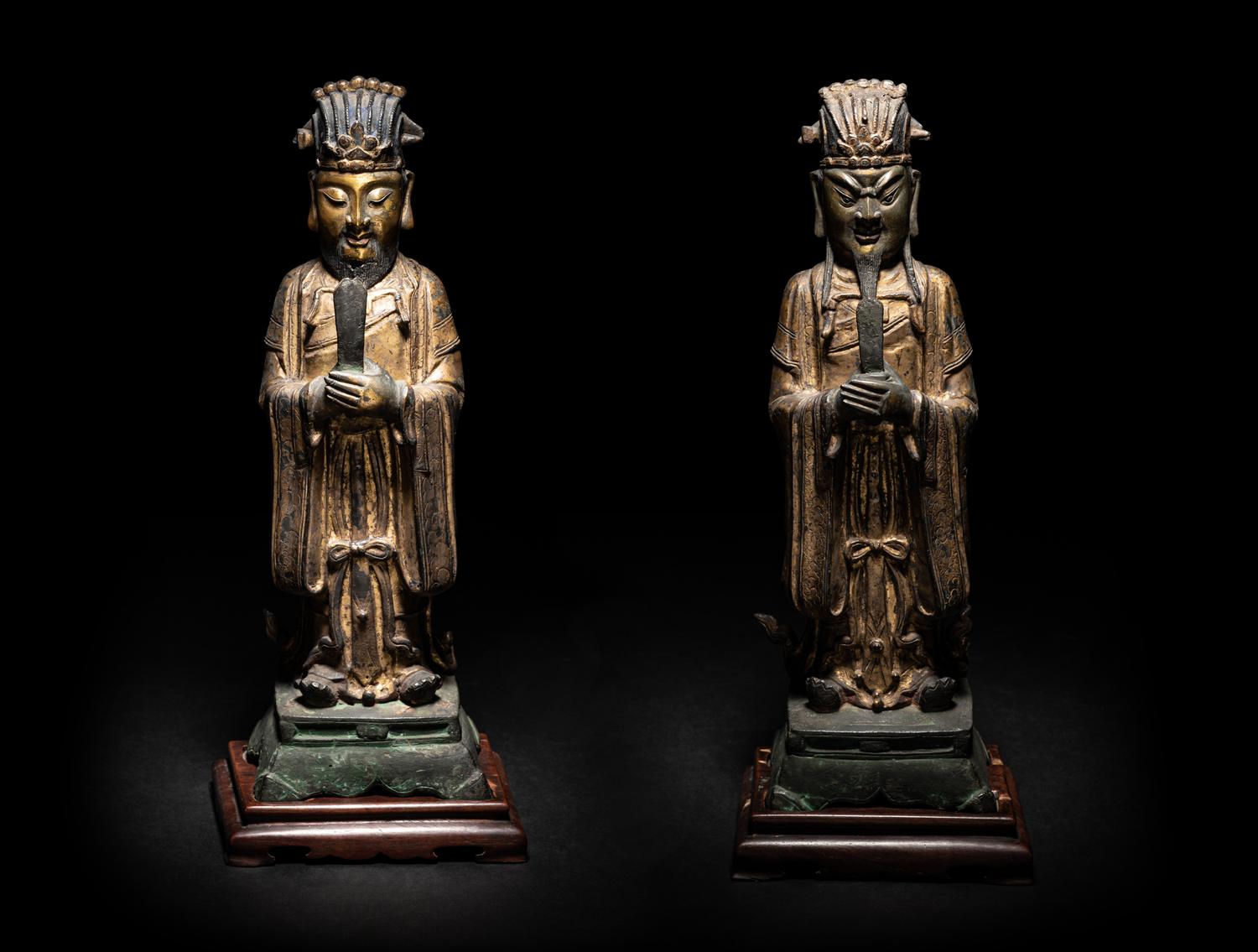 A Pair of Chinese Gilt Decorated Bronze Figures of Standing Officials