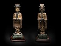A Pair of Chinese Gilt Decorated Bronze Figures of Standing Officials