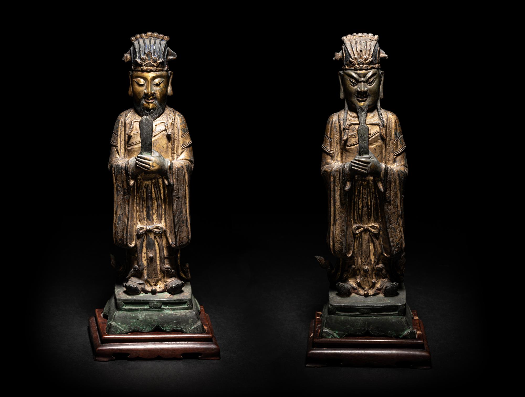 A Pair of Chinese Gilt Decorated Bronze Figures of Standing Officials