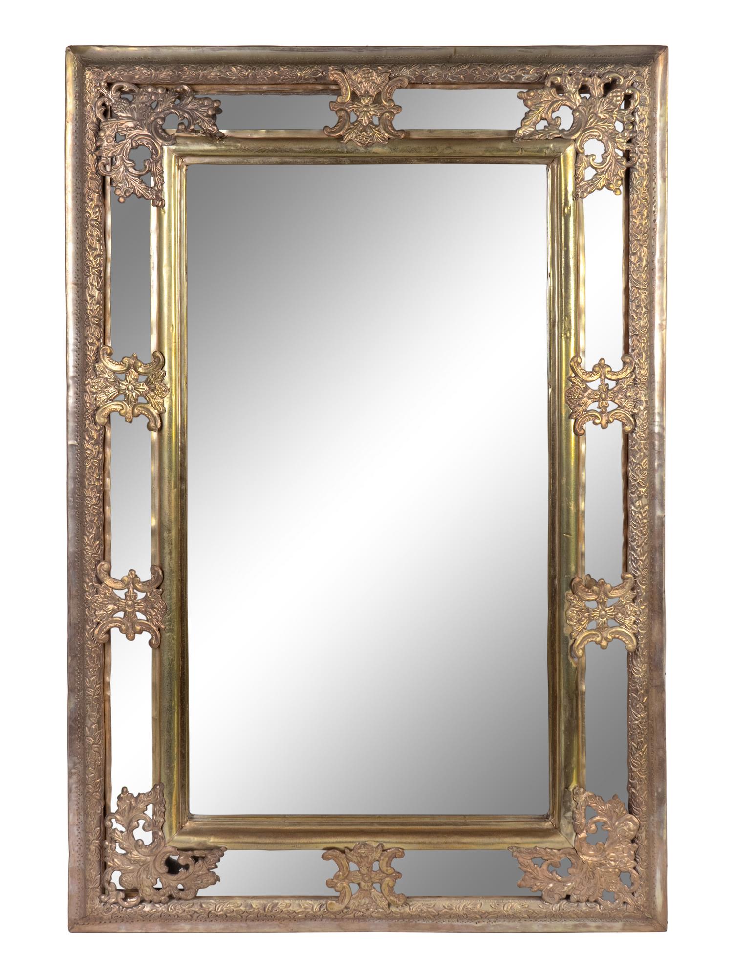A Baroque Style Repouseed Brass and Beveled Glass Rectangular Mirror — 20TH CENTURY