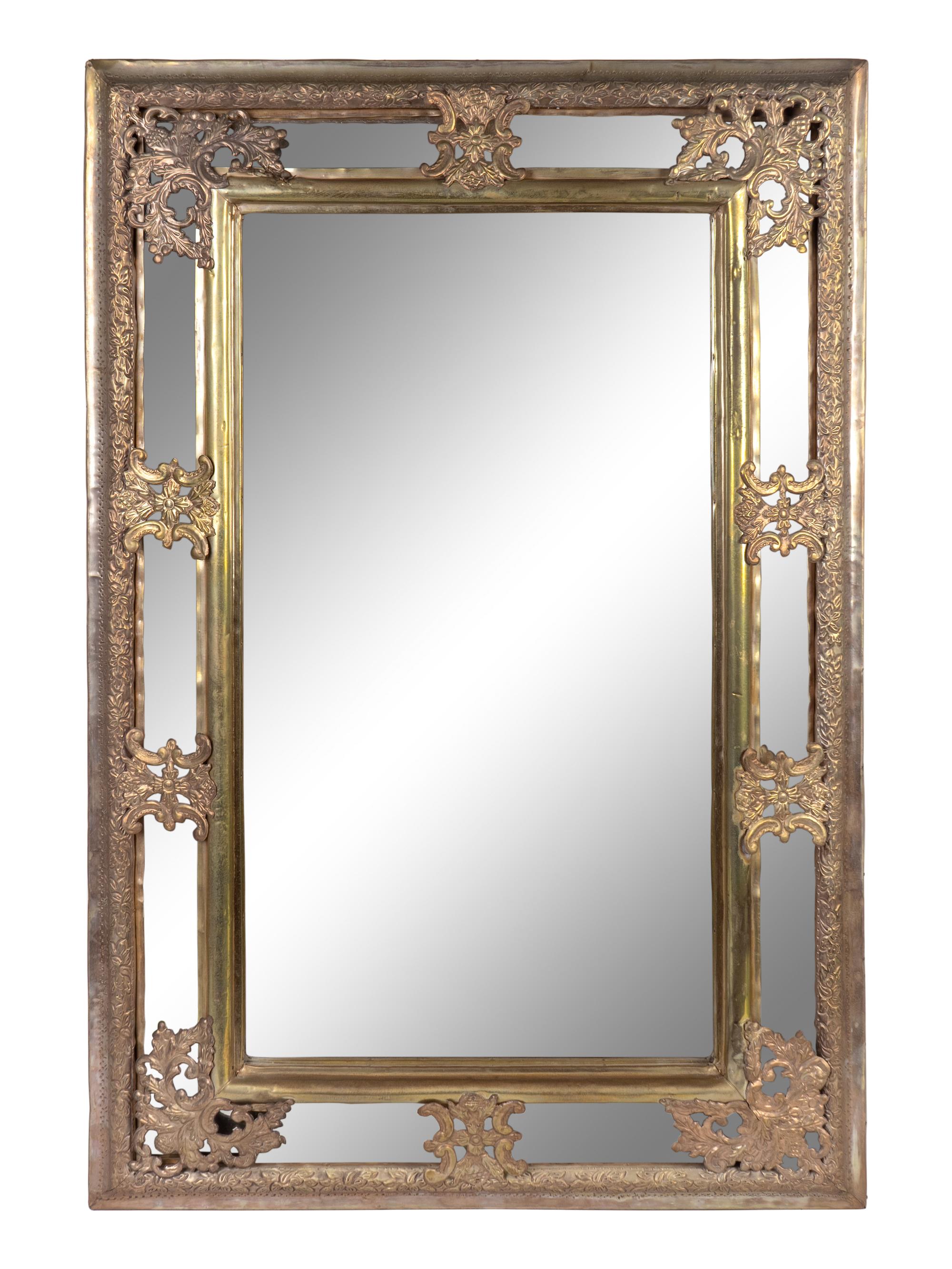 A Baroque Style Repouseed Brass and Beveled Glass Rectangular Mirror — 20TH CENTURY