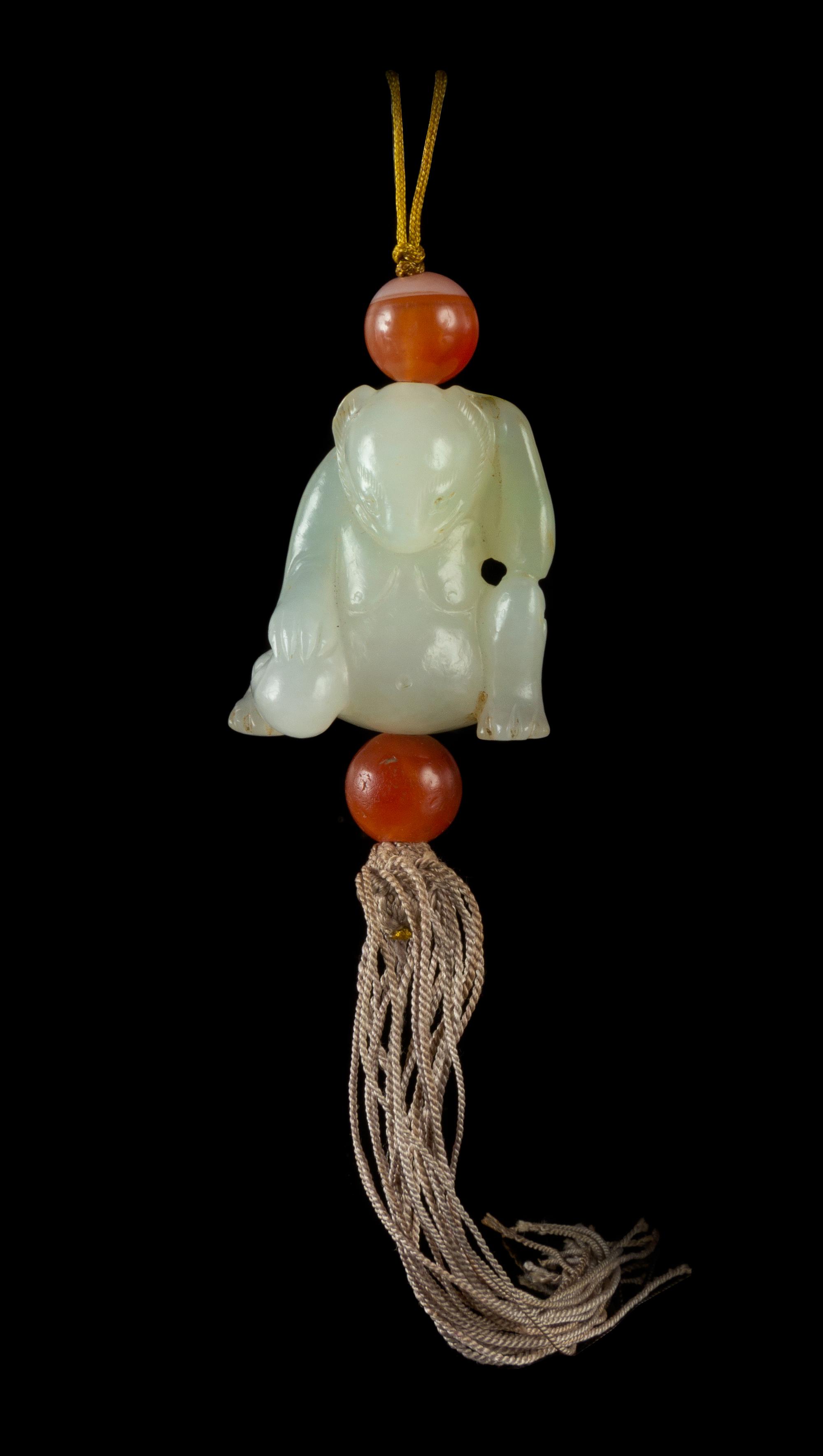 A Carved White Jade Figure of a Bear