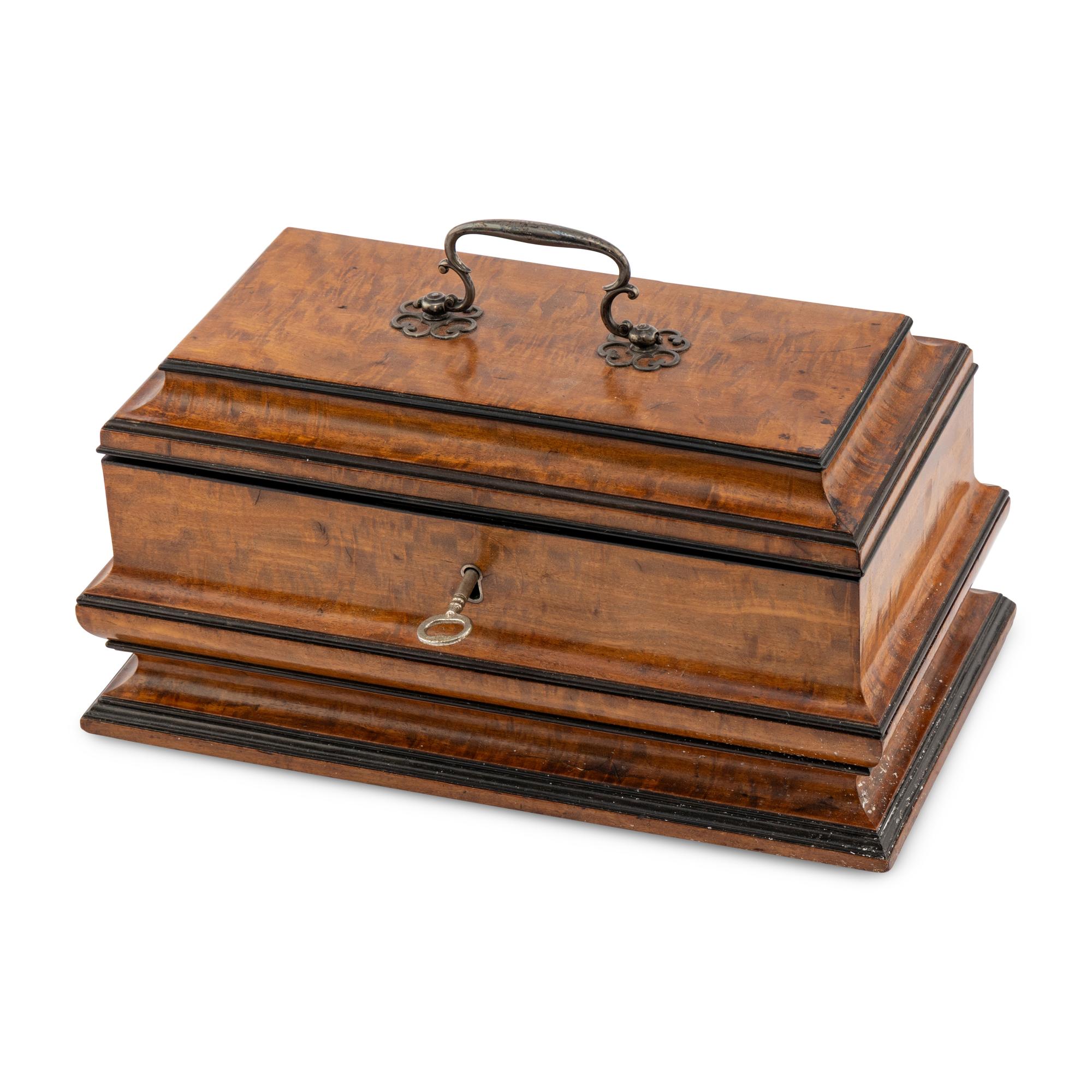 An English Mahogany and Parcel-Ebonized Tea Caddy