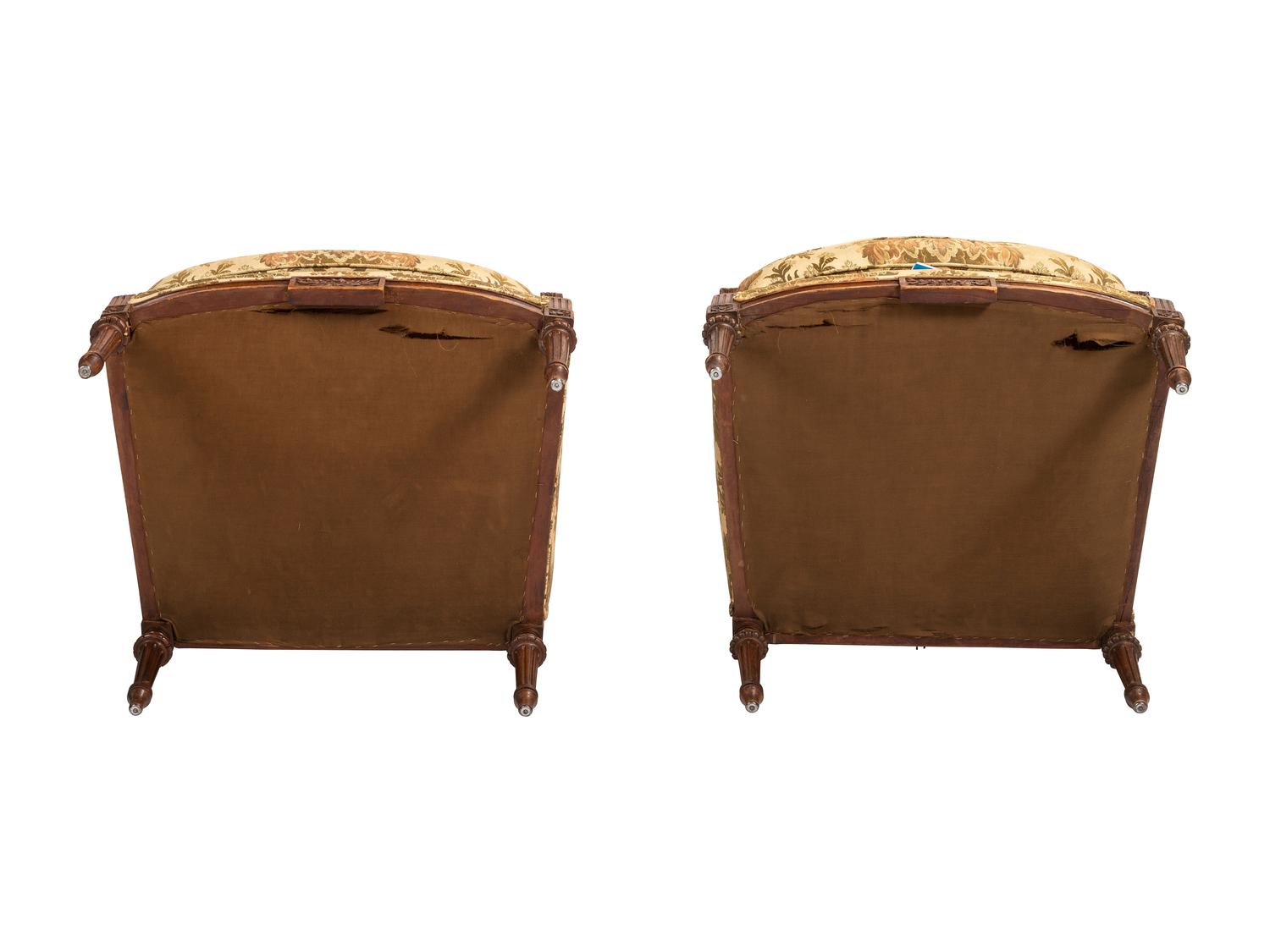 A Pair of French Louis XVI-style Walnut Bergeres