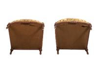 A Pair of French Louis XVI-style Walnut Bergeres