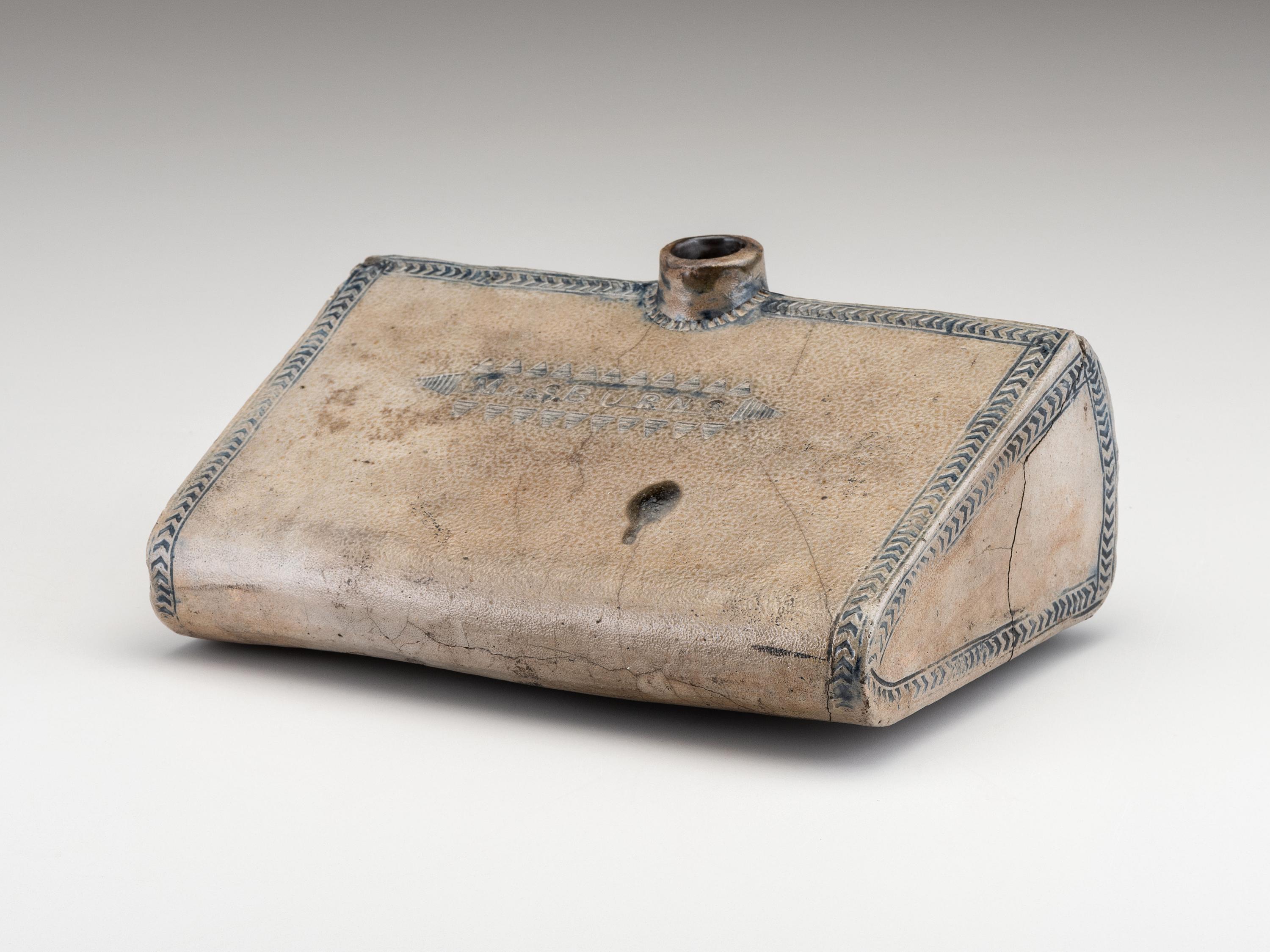An Early Incised and Cobalt Decorated Stoneware Foot Warmer