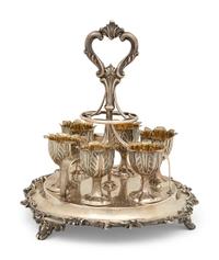 An English Silver Six-Egg Cruet and Footed Silver and Cobalt Glass Basket
