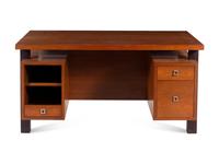 A Knowlton Bros. Walnut Desk with Ebonized Supports