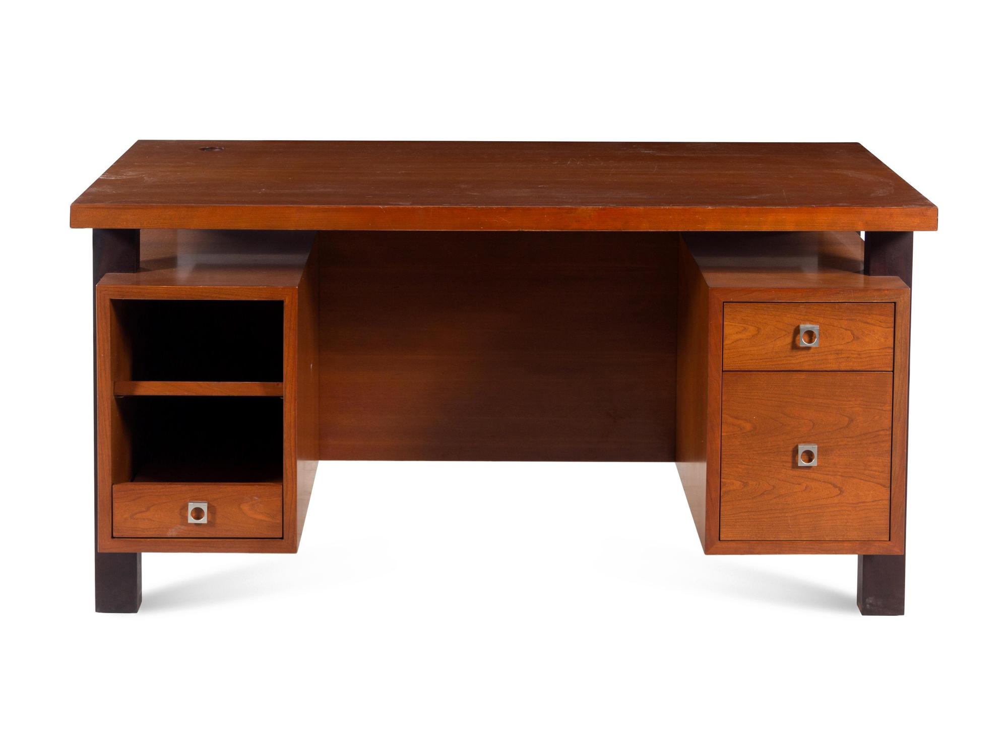 A Knowlton Bros. Walnut Desk with Ebonized Supports