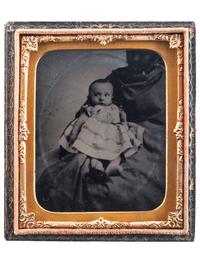 [EARLY PHOTOGRAPHY]. Sixth plate and sixteenth plate tintypes of African American women holding white children, comprising: