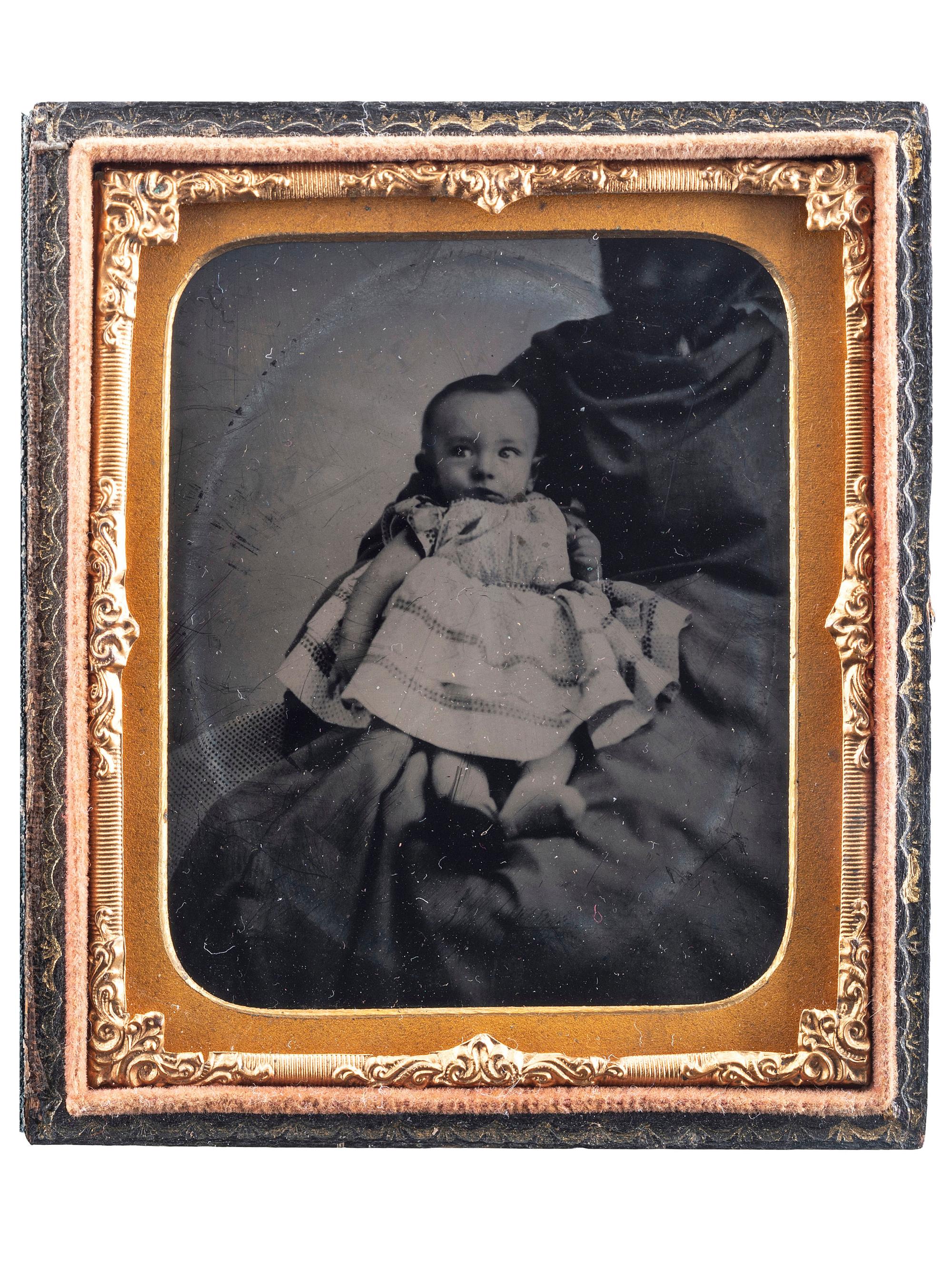[EARLY PHOTOGRAPHY]. Sixth plate and sixteenth plate tintypes of African American women holding white children, comprising: