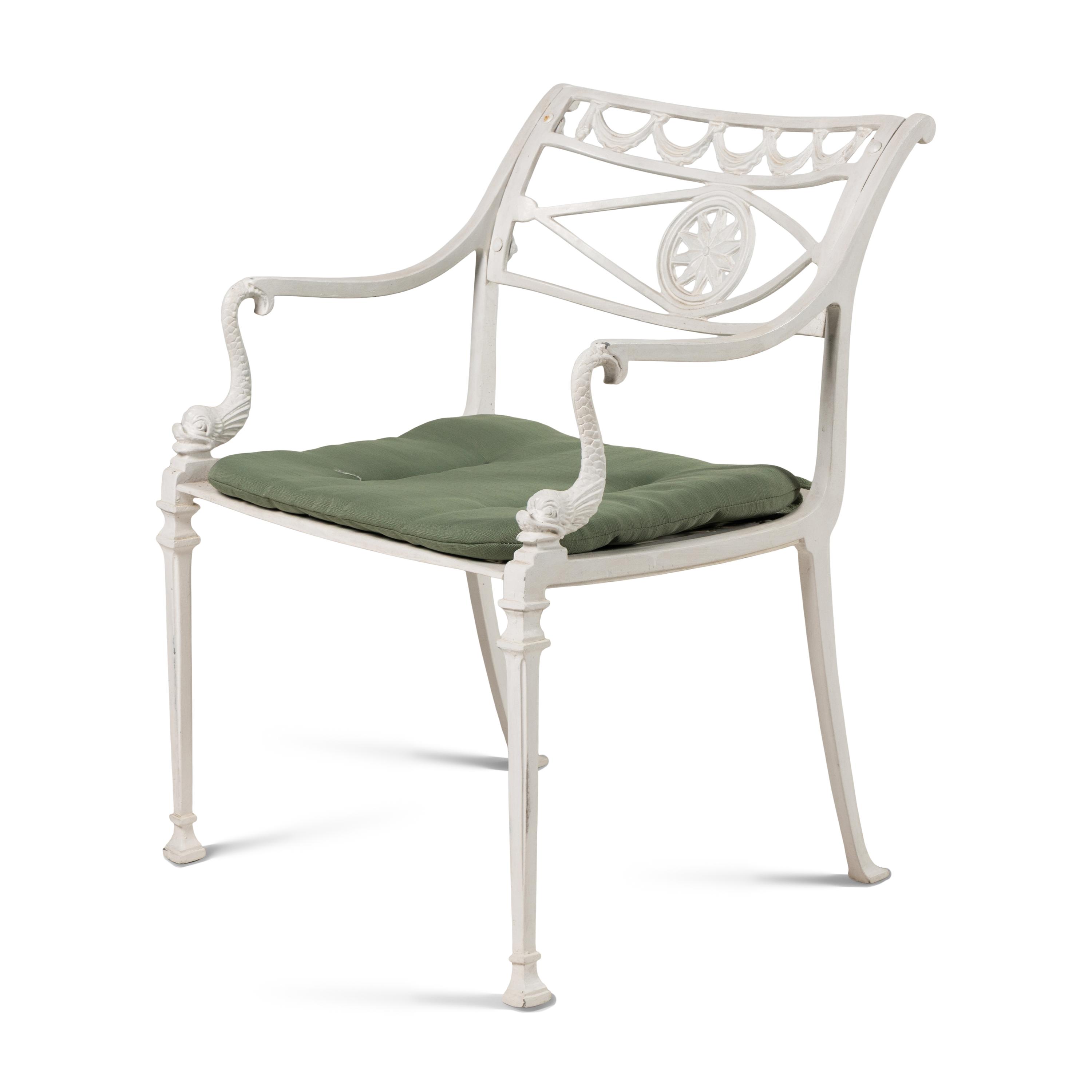 A White-Painted Cast Iron Outdoor Dining Suite