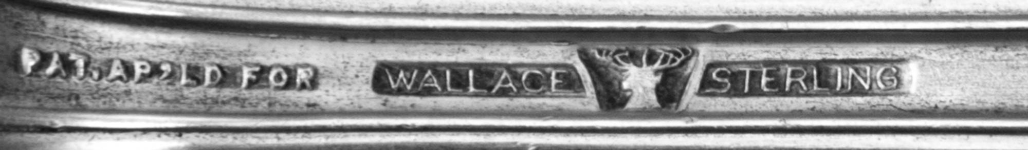 An American Silver Flatware Service , Wallace Sterling, Wallingford, MA , Rose Point pattern, comprising: 12 dinner knives 12 butter sp
