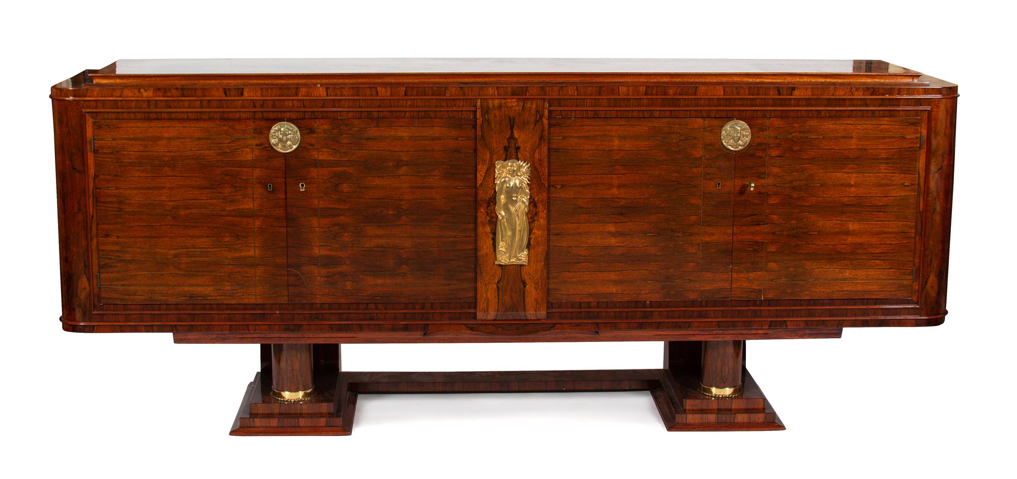An Art Deco Brazillian Rosewood Gilt Bronze Mounted Sideboard Height 41 1/2 x width 103 1/2 x depth 20 inches. — EARLY 20TH CENTURY