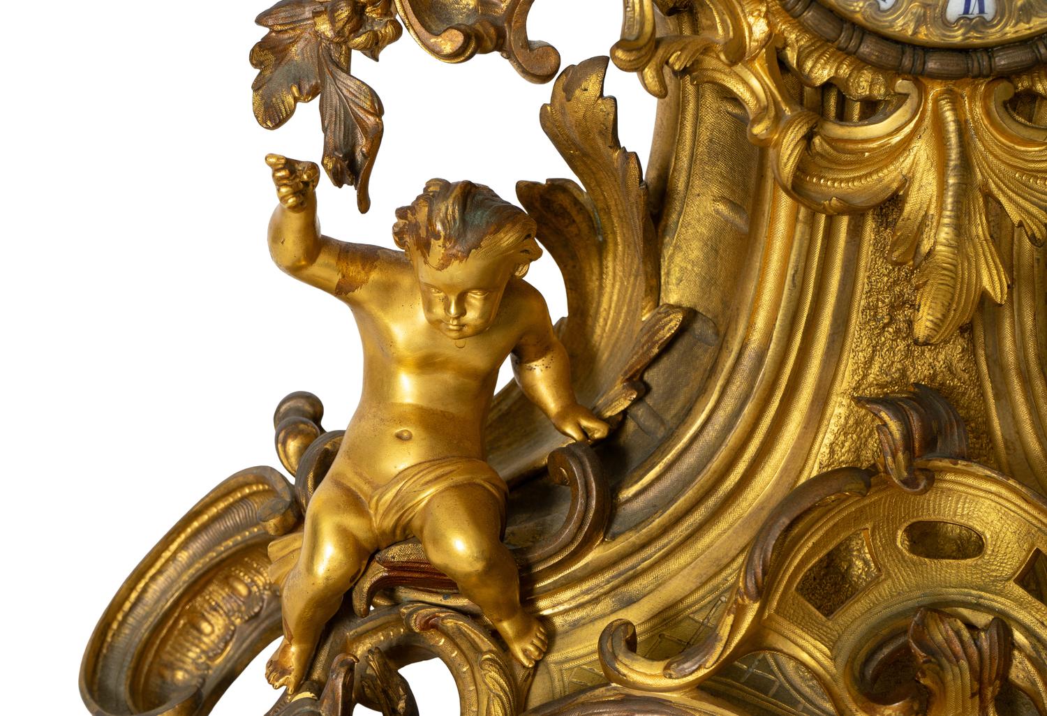 A French Rococo Style Gilt Bronze Mantel Clock