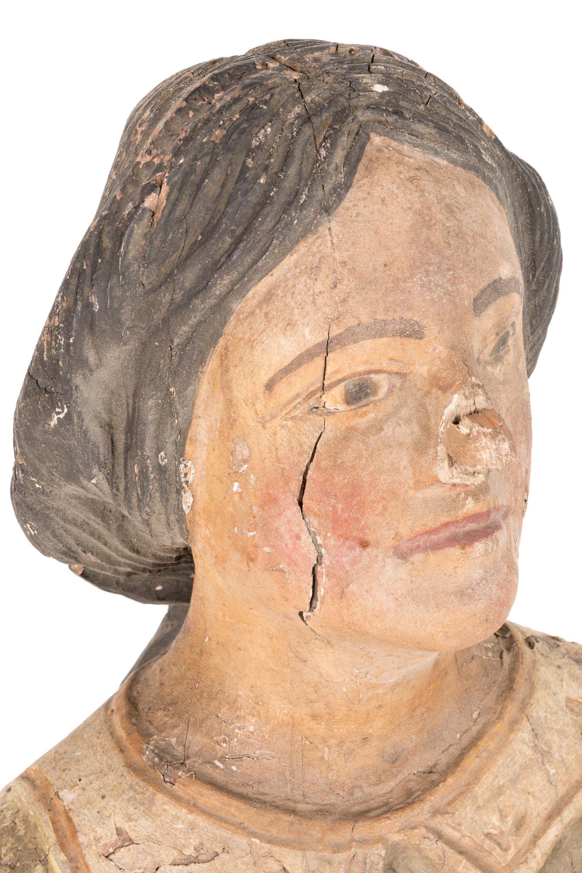 An American Carved and Painted Wood Female Figurehead for a Ship