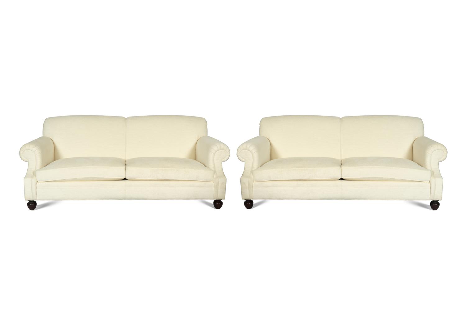 A Pair of Ralph Lauren Two-Cushion Ivory Chenille-Upholstered Sofas