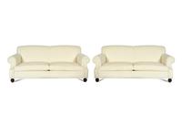 A Pair of Ralph Lauren Two-Cushion Ivory Chenille-Upholstered Sofas