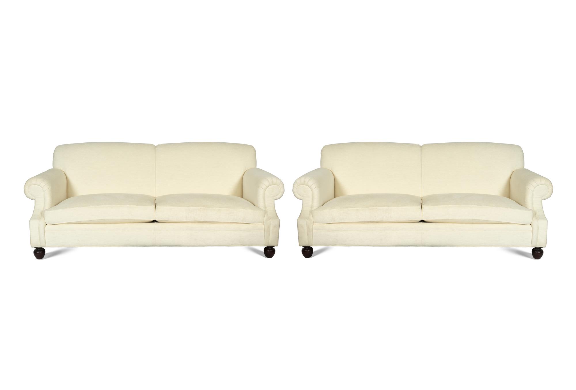 A Pair of Ralph Lauren Two-Cushion Ivory Chenille-Upholstered Sofas