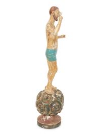 An Italian Carved and Polychromed Giltwood Santos Figure