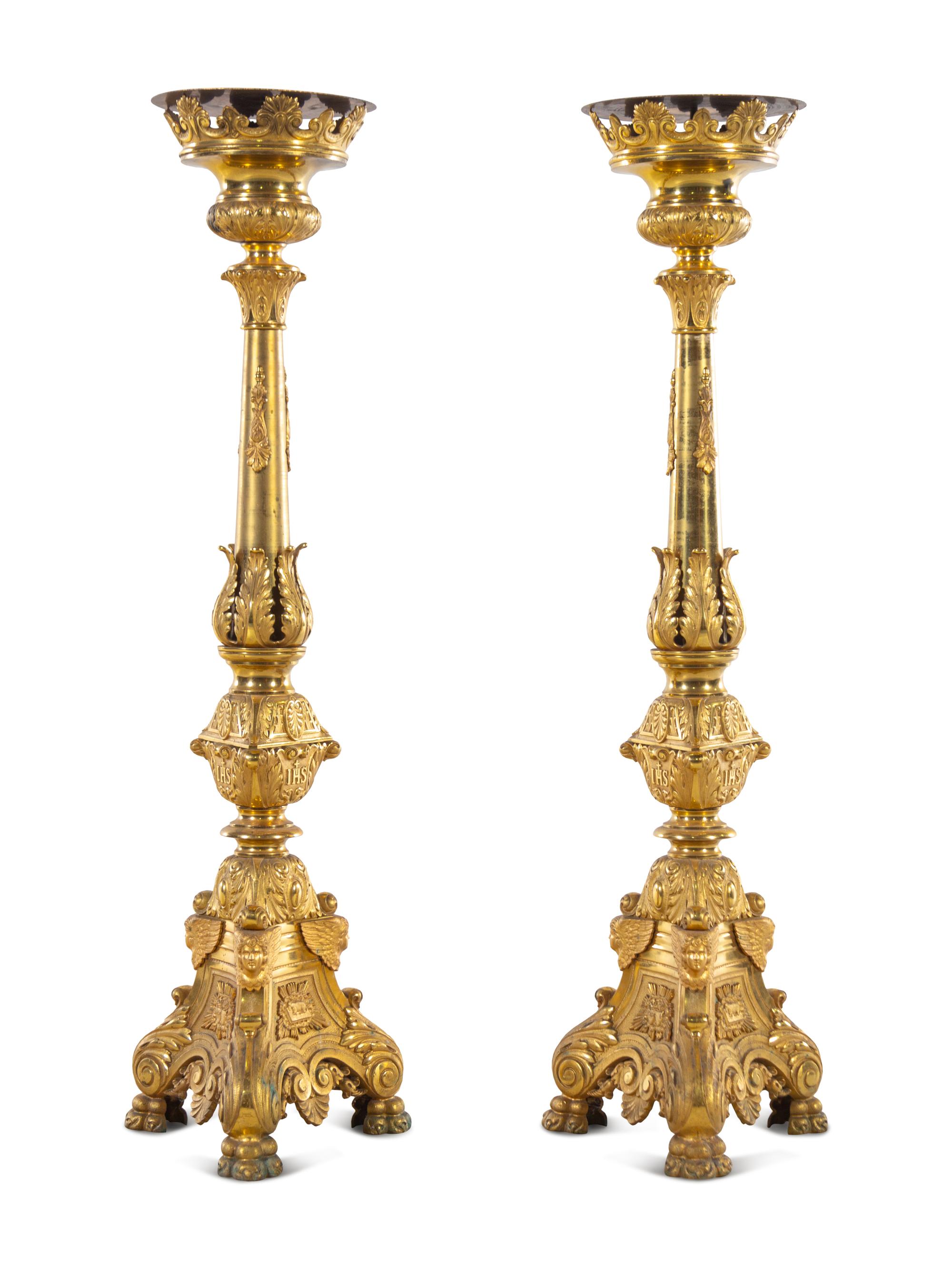 A Pair of Gilt Brass Altar Candlesticks with Associated Marble Tops