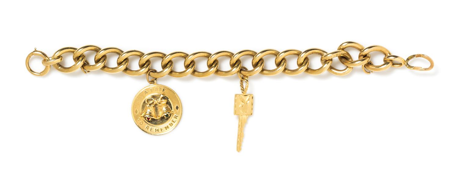 A 14 Karat Yellow Gold Charm Bracelet, 45.30 dwts.