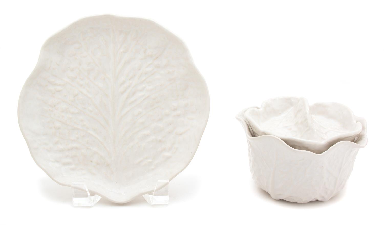 A Group of Twelve Portuguese White Glazed Ceramic Cabbage-Form Covered Bowls and Undertrays Diameter of undertray 7 1/4 inches. — 20TH CENTURY