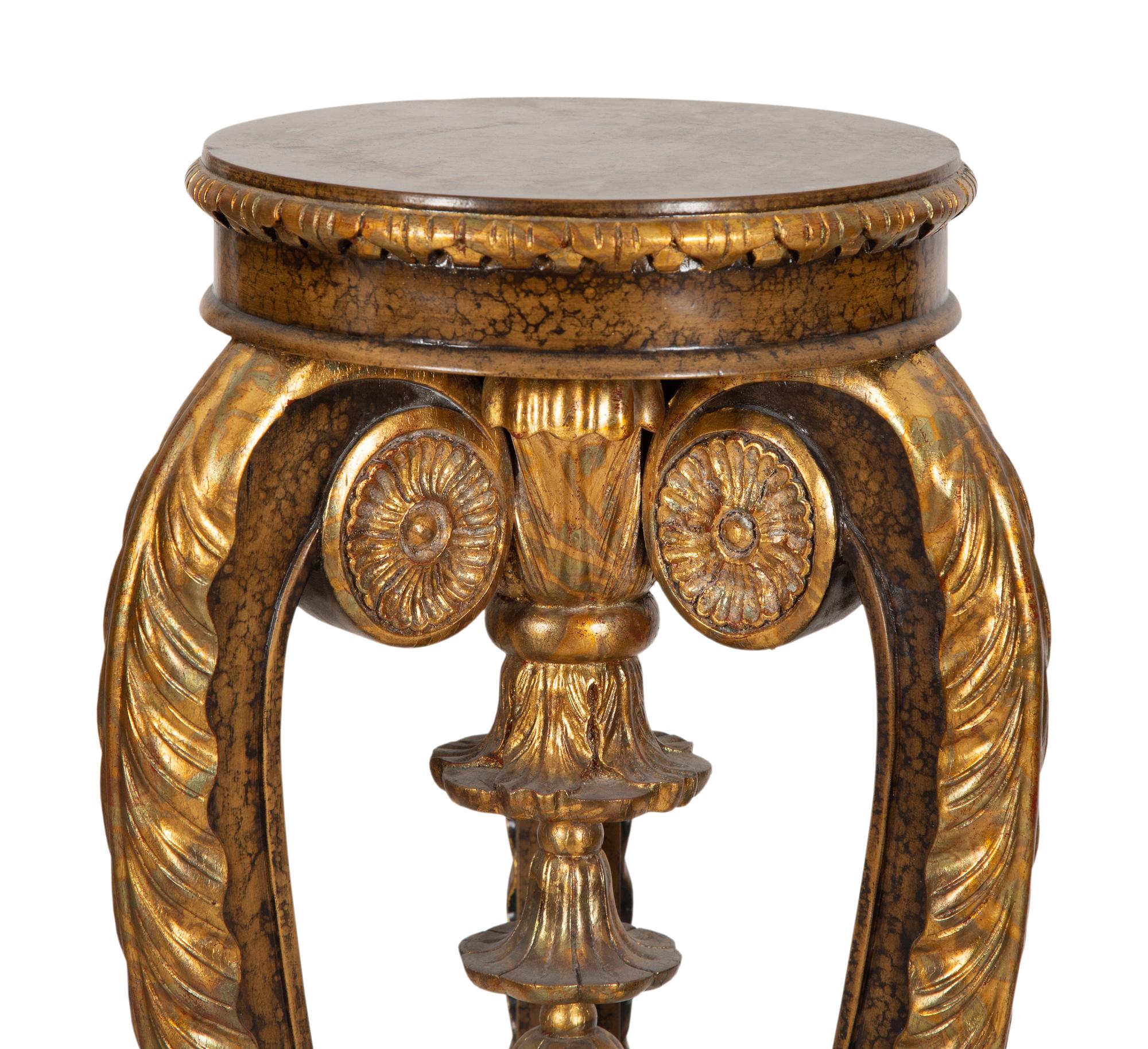 A Pair of Painted and Parcel Gilt Pedestals