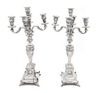 A Pair of Austro-Hungarian Silver Candlesticks, Maker's Mark G&S, Vienna, Late 19th/Early 20th Century, each baluster form stem issuing