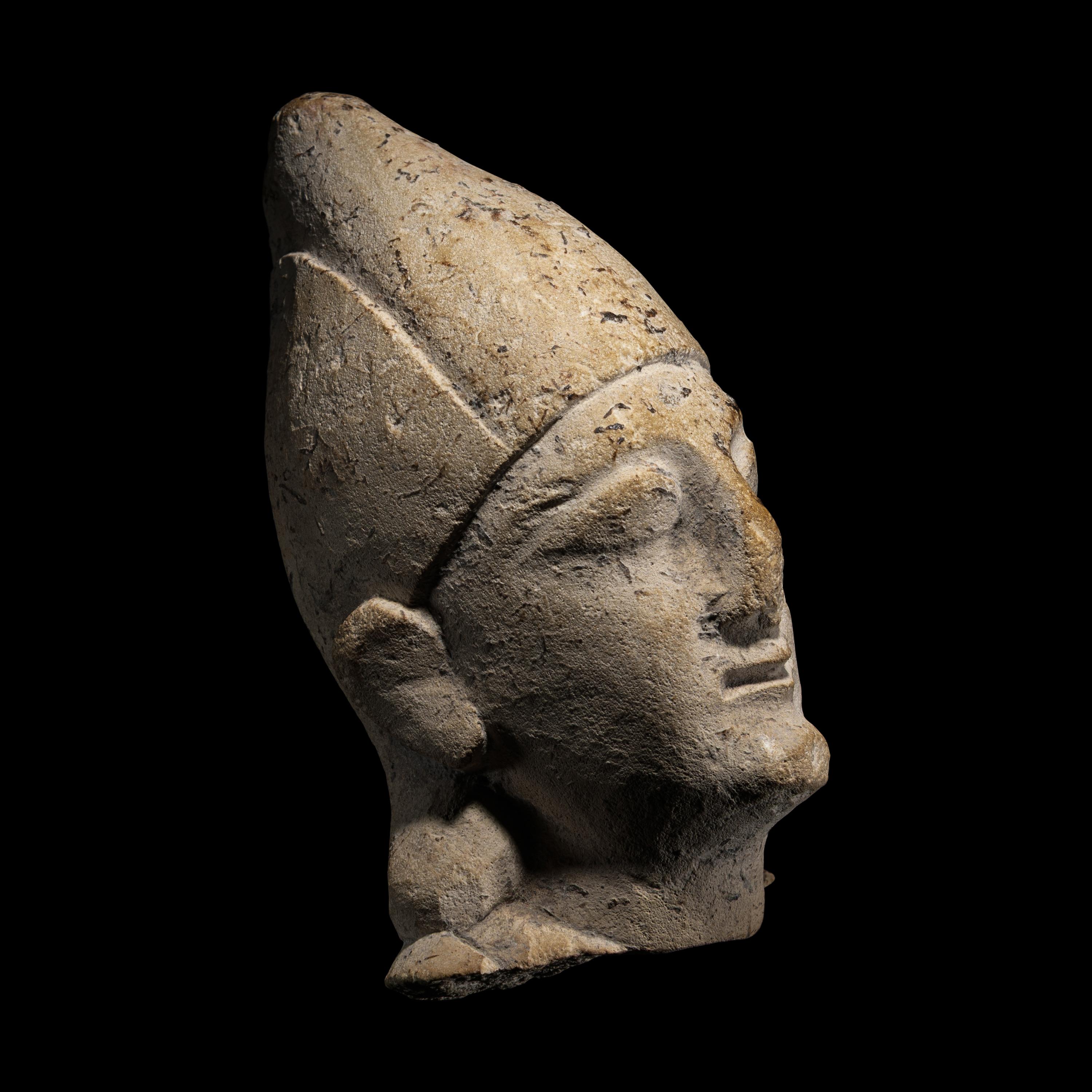 A Cypriot Limestone Votive Head